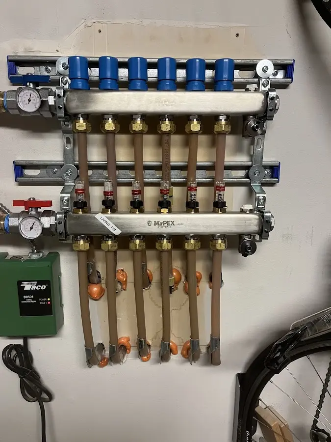 Plumber performing Water Heater Repair at a residential property in Parker