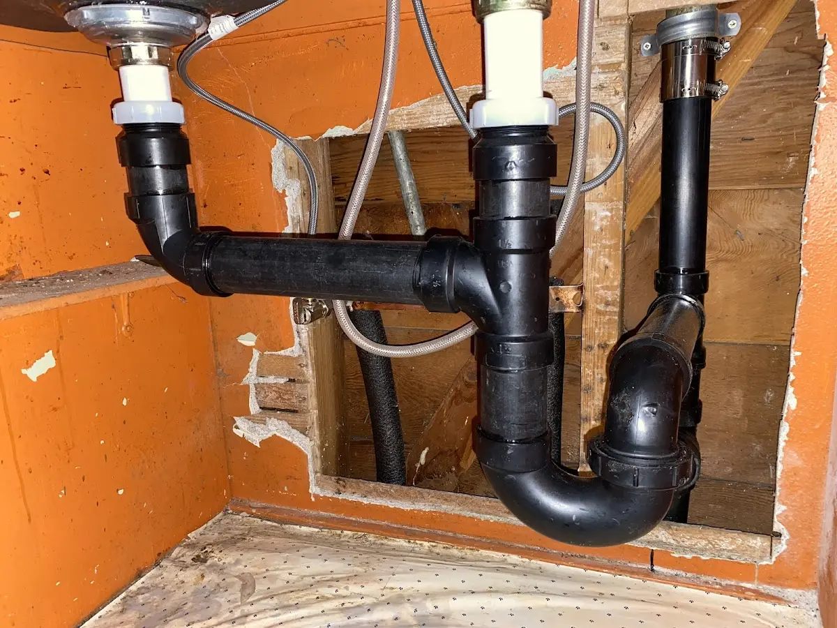 Professional Garbage Disposal Repair equipment and tools on the job in Parker
